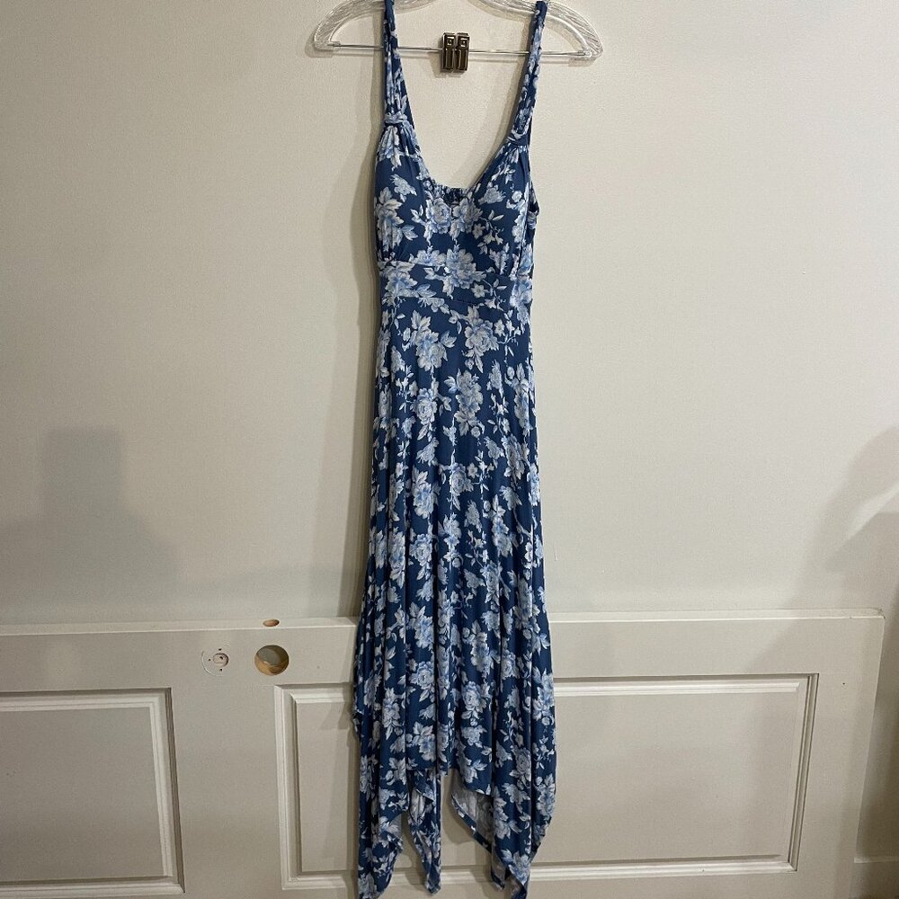 Blue floral jersey knit dress with handkerchief hem